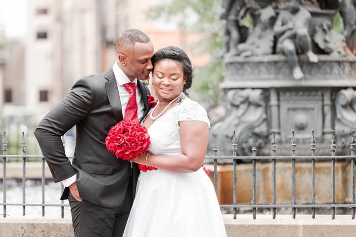 The rain stopped just in time for the newlyweds to take some wedding pics outdoors.