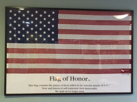 American flag containing the names of those killed in the terrorist attacks of 9/11