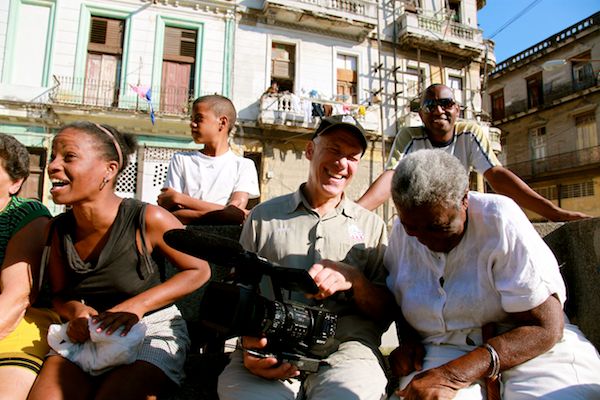 Director Jon Alpert (center wearing a cap) on the set of ‘Cuba and the Cameraman’.
