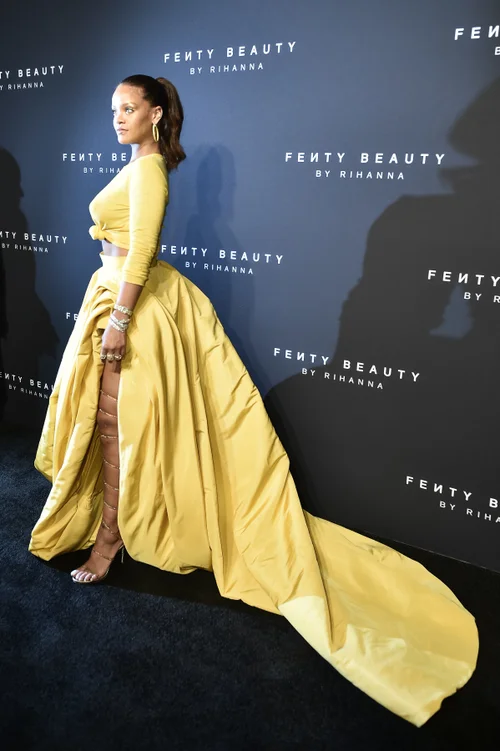 rihanna yellow silk dress Rihanna's stunning 'Yellow Queen' dress on exhibit in Singapore - Art & Culture