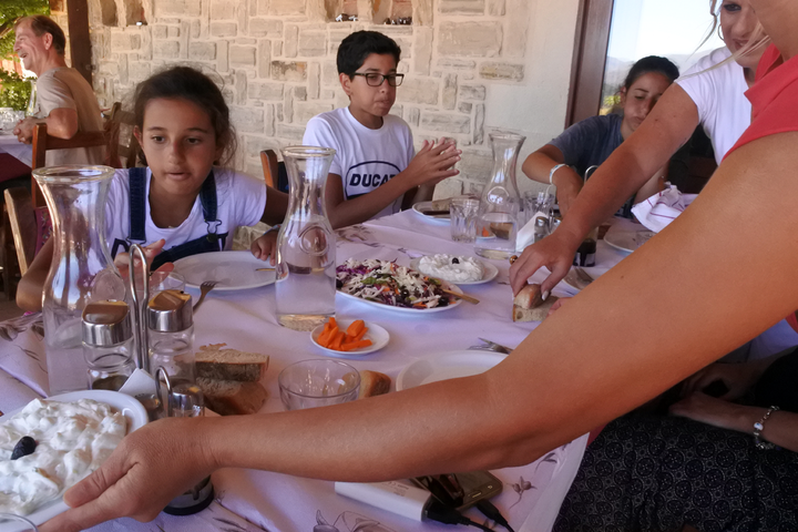 <p>Food somehow tastes better after you work for it. A simple Cretan meal at Taverna Aravanes was the highlight of the day.</p>