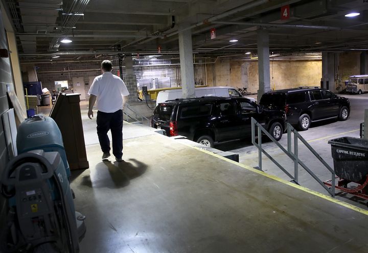 SUV's in the loading dock of the US Capitol used by Donald Trump Jr yesterday - the hearing was held in the building's basement.