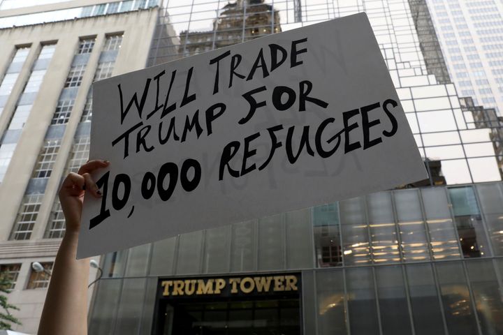 Protestors outside Trump Tower, New York where the meeting was held.
