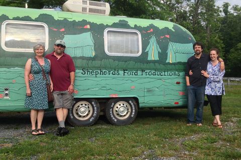 Shepherds Ford Productions Mobile Office (remote site during festivals) with founders Frazer and Lisa Watkins (left) and Dave van Deventer and Morgan Morrison (right). Photo Courtesy/Shepherds Ford Productions 