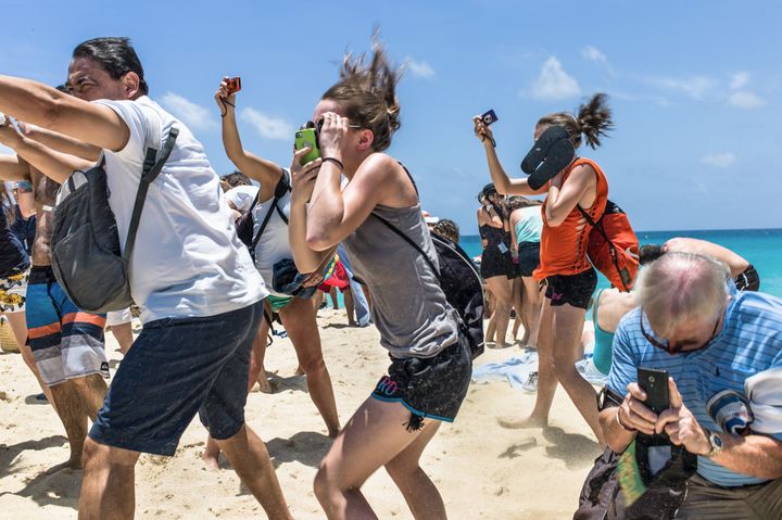 Tourists would often cower beneath the blast of the jet engines 