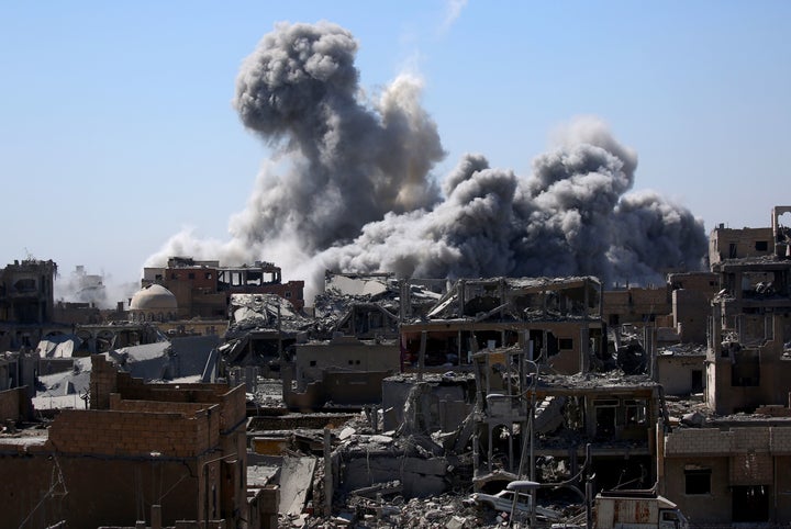 Smoke billows in Raqqa on Sept. 3.