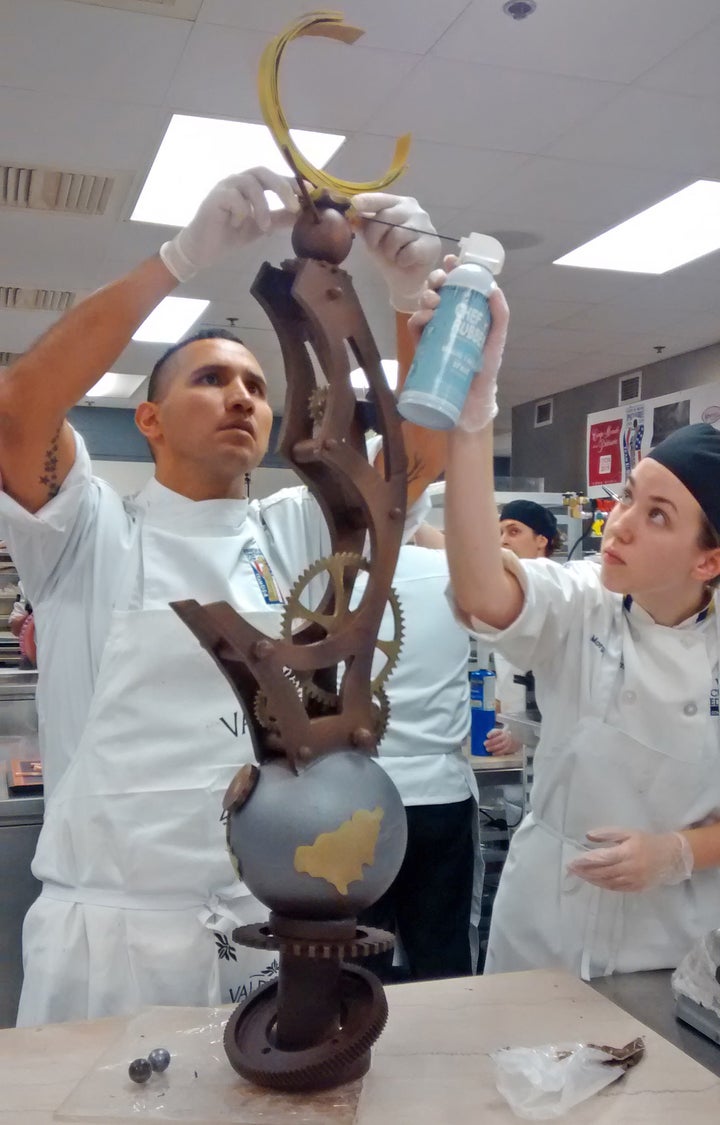 <p>Robert Nieto with his student assistant Morgan Brown </p>