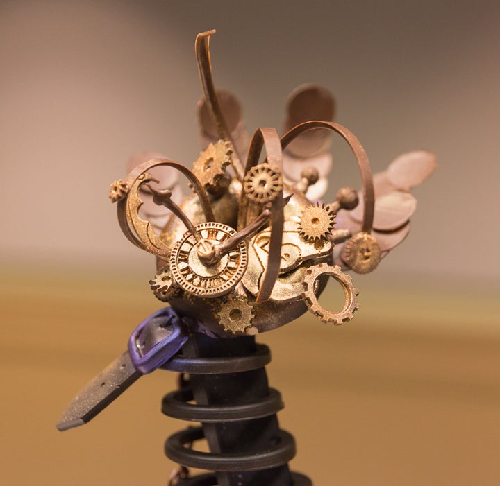 <p>Close up of a wristwatch exploding atop Thierry Aujard’s chocolate showpiece</p>