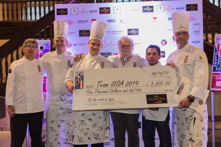 <p>Team USA for the 2019 Coupe du Monde de la Pâtisserie, left to right: Gilles Renusson Club President, Jordan Snider team alternate, Nicolas Chevrieux team sugar artist, Gabriel Paillasson Coupe du Monde Founder, Victor Dagatan team ice sculptor, and Olivier Saintemarie team chocolate artist </p>