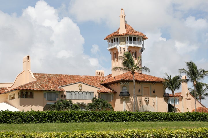 President Donald Trump's Mar-a-Lago mansion is shown with shutters on the windows Friday after a mandatory evacuation order went into effect on the barrier island of Palm Beach, Florida.