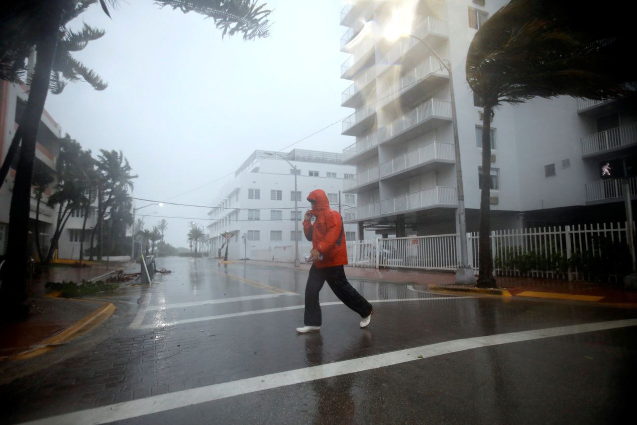 Man walks along a street in South Beach as Hurricane Irma arrives at south Florida.
