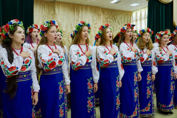 Music students sing the Ukrainian national anthem at the Special Music School Lysenko of Kiev as the first of September tradi