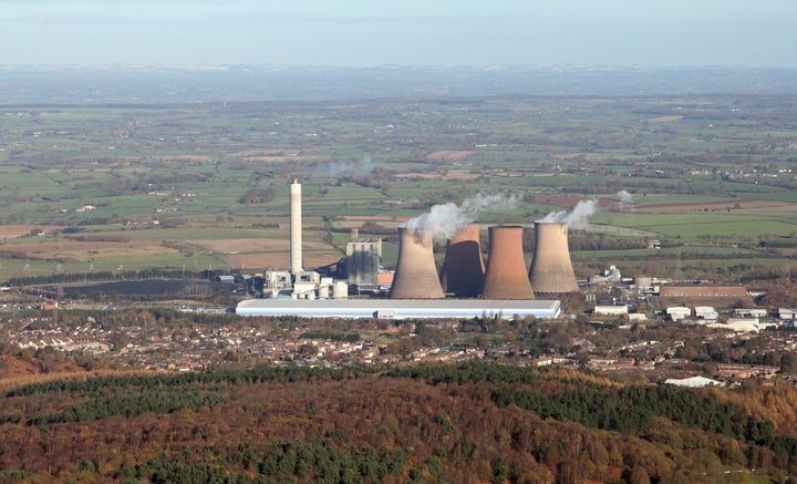 The vast Amazon warehouse, blue low-lying building, centre, straddles a now disused power station in rural Staffordshire. The closest big centres to the site are Wolverhampton and Birmingham