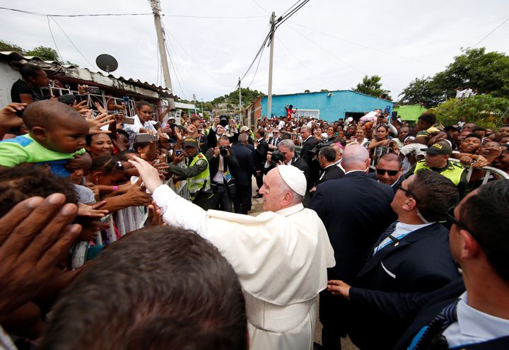 Pope Francis greets people in a neighbourhood in Cartagena, Colombia September 10, 2017. 
