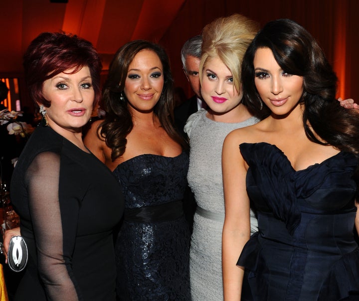 Sharon Osbourne, Leah Remini, Kelly Osbourne and Kim Kardashian pose together at the 19th Annual Elton John AIDS Foundation i