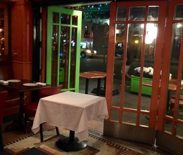 A re-staging of the table by the window at the Trattoria Dell’ Arte some 20 years later