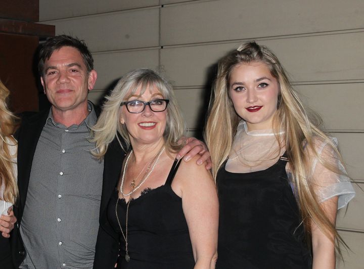Louella Michie, picture here in 2015, far right, besides her father John, left, and mother Carol, centre