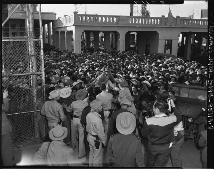 The Braceros workers came legally to work in the US during World War II. Here, a group of Braceros crossing the border at Mexicali in 1954. (Los Angeles Times photographic archive, UCLA Library via Wikimedia Commons)