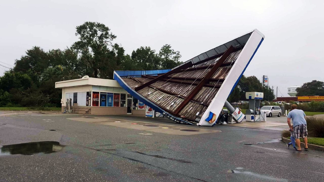 A damaged Chevron station in the city of Live Oak, Florida.