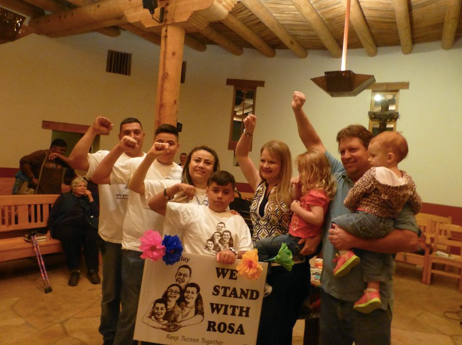 Rev. Alison Harrington and her family (right) with the family of Rosa Robles Loreto, an undocumented immigrant who was living in sanctuary at Southside for 15 months in 2014.