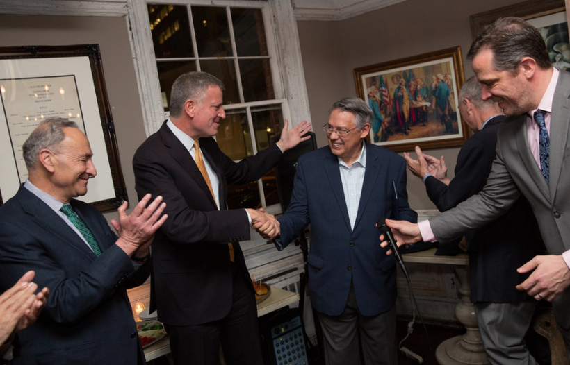 Mayor de Blasio and Chuck Schumer at the retirement party for Juan Gonzalez