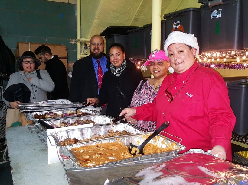 Beltzer (3rd from left) and Rev. Carmen Hernandez (right)
