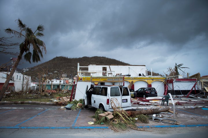 A picture shows a wrecked car in the streets of Marigot, on Sept. 9 in St. Martin island devastated by Irma hurricane.