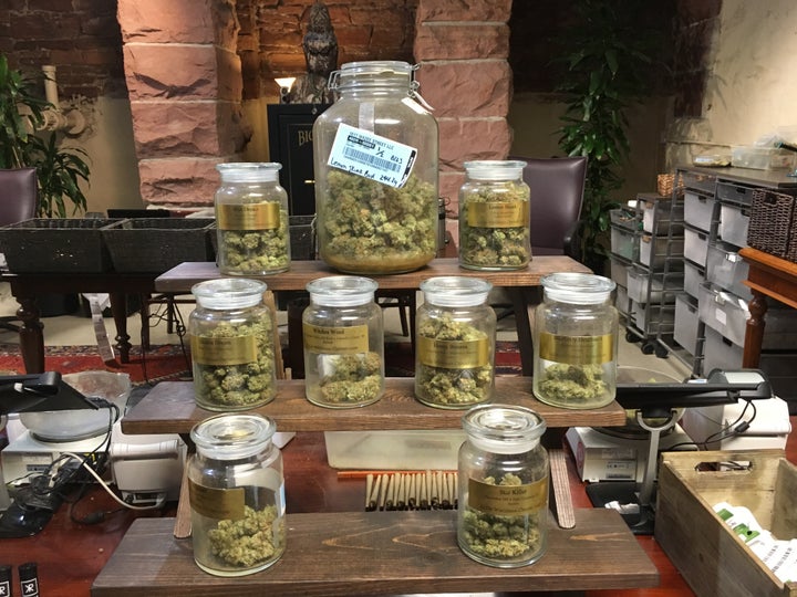 A variety of marijuana strains on display at a Denver dispensary. Despite its commercial availability in eight states, homegrown marijuana is thriving. Three states are limiting how many plants home growers can cultivate.