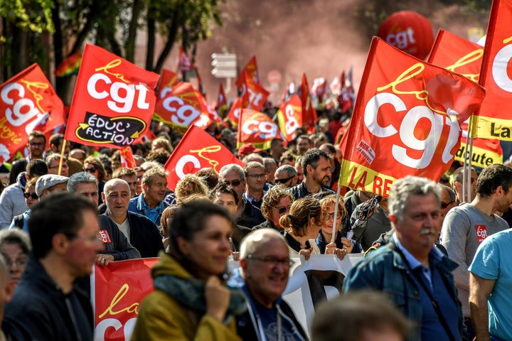 People take part in a demonstration called by several French unions against the labour law reform in Lille, on September 12, 2017. 