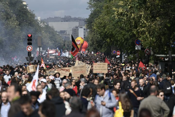 Demonstrators take part in a protest called by several French unions against the labour law reform in Paris, on September 12, 2017.