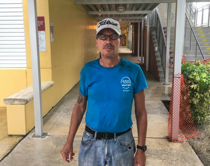 Carl Farmer, a 53-year-old man who is homeless, stands outside of a shelter in Miramar after being picked up by police.