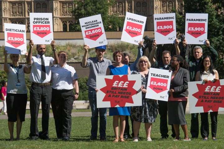 Pay protests by public sector workers outside Parliament.