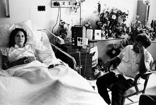 <p>Dolores Huerta at S F General Hospital recovering from an intense beating by SFPD, 1988</p>