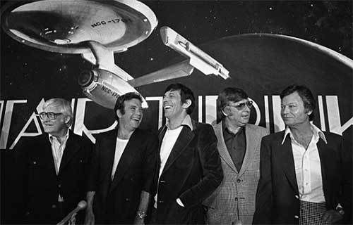 Robert Wise (far left) keeps his distance from Gene Roddenberry (second from right) at a “Star Trek: The Motion Picture” press conference.