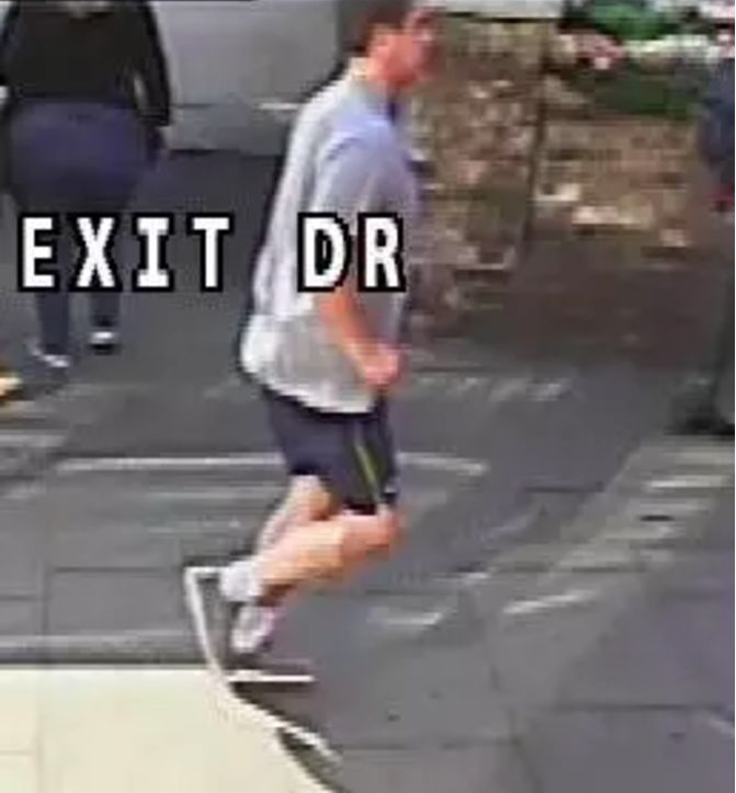Police have released a new image of the jogger suspected of pushing a woman in front of a double-decker bus on Putney Bridge 