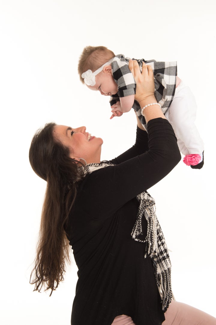 Pictured are St. Jude cancer survivor Tayde Cruz Dodds and her 10-month-old daughter. She works on the Patient Outreach team for ALSAC, the fundraising and awareness organization for St. Jude Children’s Research Hospital.