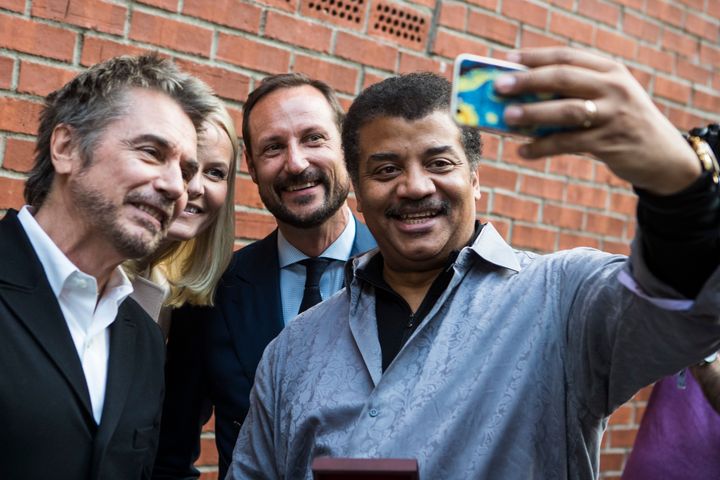 Neil de Grasse Tyson takes a selfie with Jean-Michel Jarre, Princess Mette-Marit and Crown Prince Haakon of Norway during the Starmus Festival, Norway.