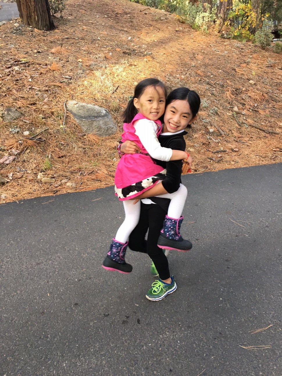 It took Kriss about four years to adopt her oldest daughter (right), but only about nine months to adopt her youngest (left).