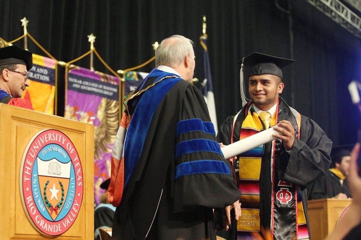 Abraham Diaz receives his diploma from the University of Texas Rio Grand Valley in May 2017.