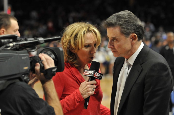 Beth Mowins, in her capacity as ESPN reporter, interviews University of Louisville basketball coach Rick Pitino in 2012. 