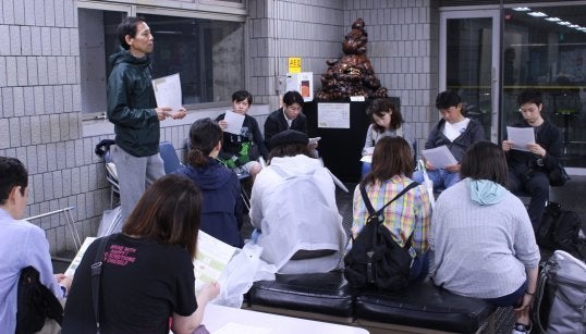 The tour guide, Ko Uji explains the plan for the tour.