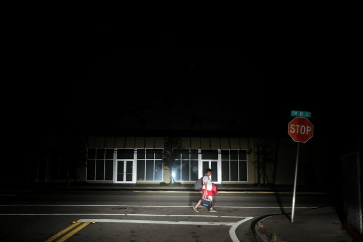 A man walks back home in the darkness as many areas of Miami still without electricity after Hurricane Irma strikes Florida, in Little Havana, Miami, Florida, September 11, 2017. REUTERS/Carlos Barria TPX IMAGES OF THE DAY