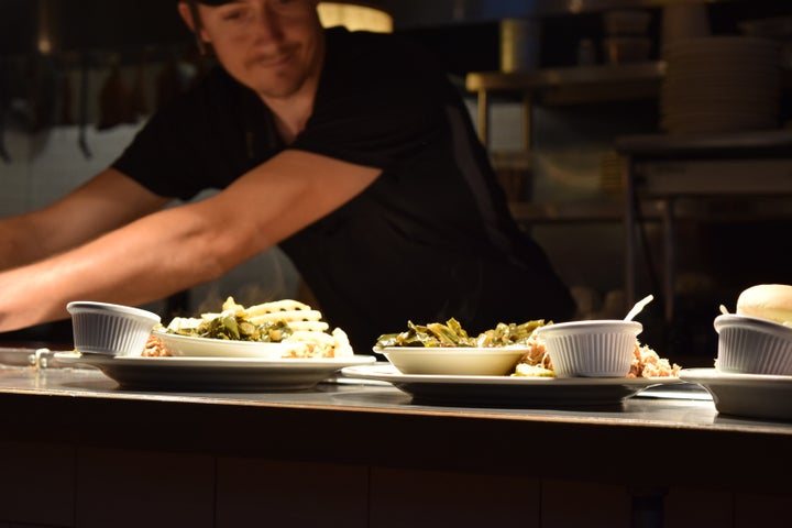 <p>Green beans and pulled pork at the pass</p>
