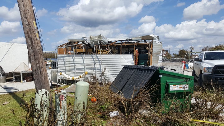 A damaged shed used by Kirk Fish Company.