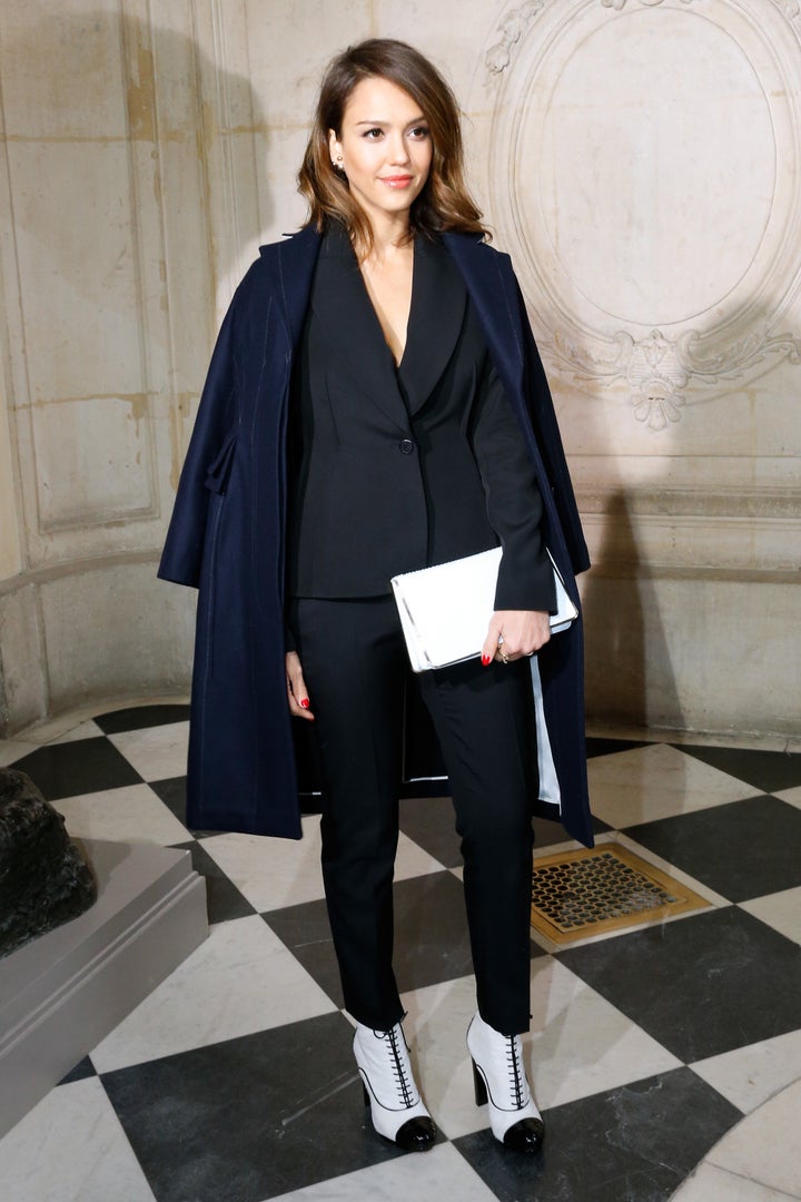 Jessica Alba mixing and matching at the Christian Dior show on Feb. 28, 2014 in Paris, France. 