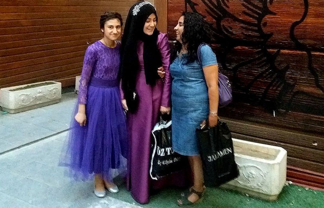 Gülmay Gümüşhan with two young girls on their way to a relative's wedding. Van, Turkey.