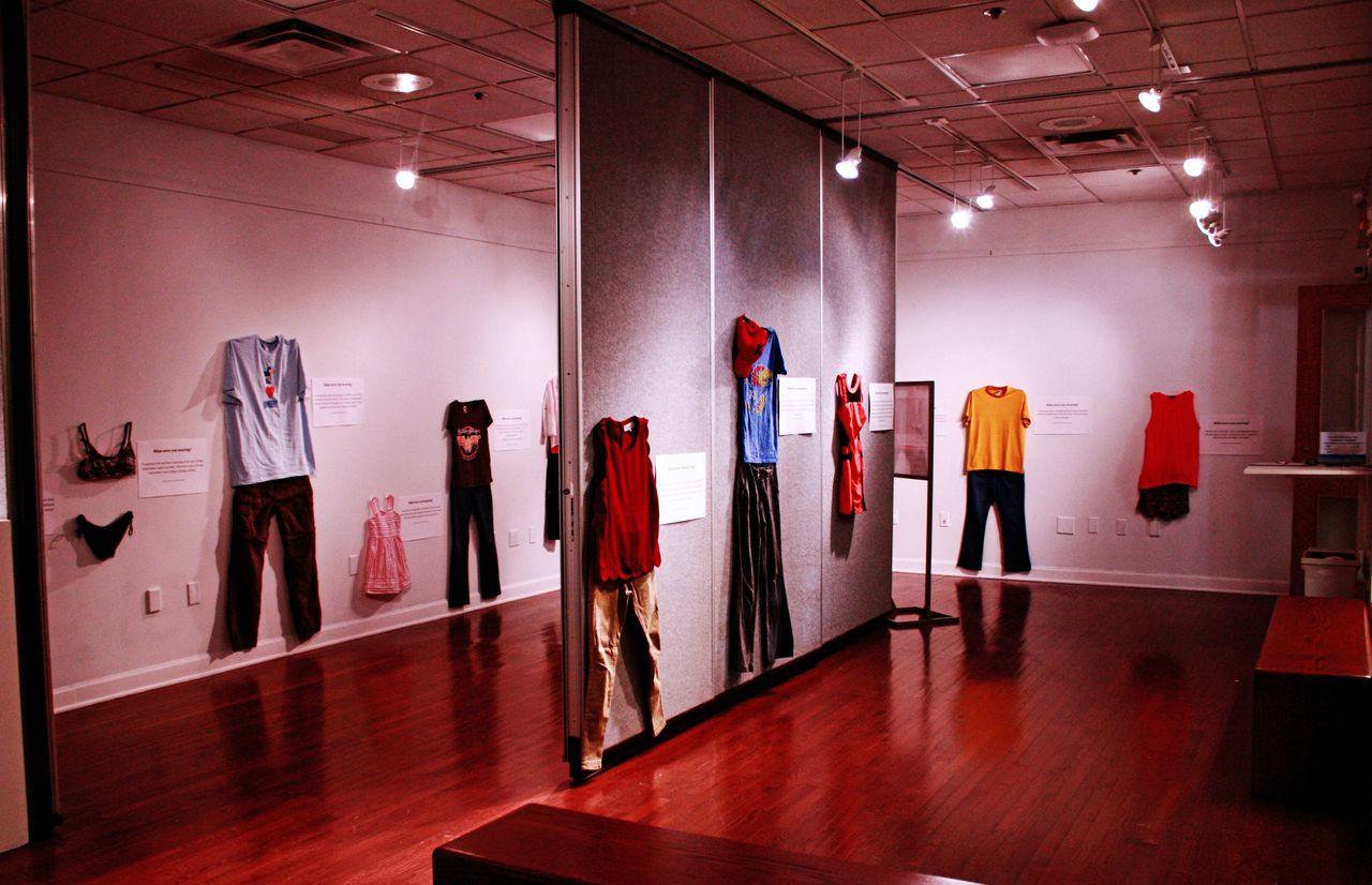 A photo of the art exhibit "What Were You Wearing?" at the University of Kansas. 
