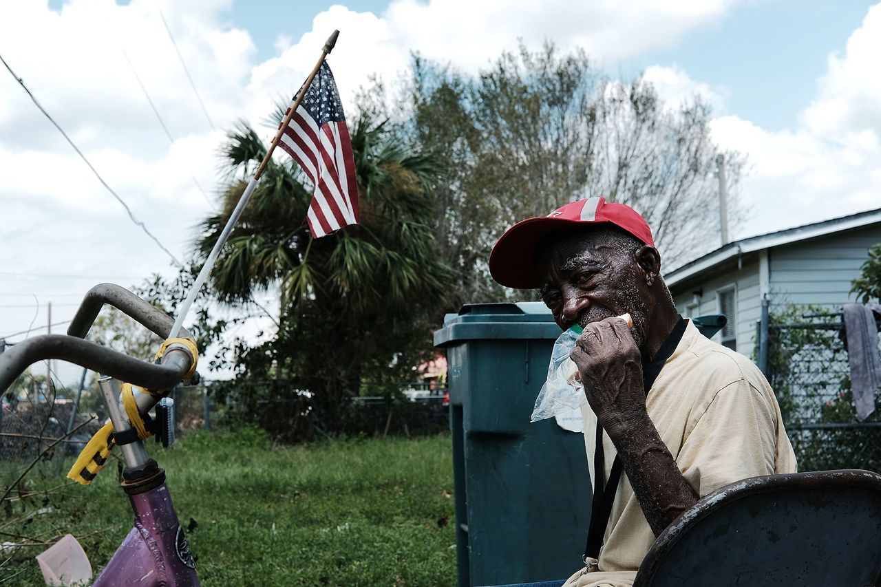 Lee Rigley in his yard in Immokalee, Florida, after Hurricane Irma.