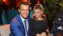 Fergie goes incognito as Josh Duhamel cradles baby Axl