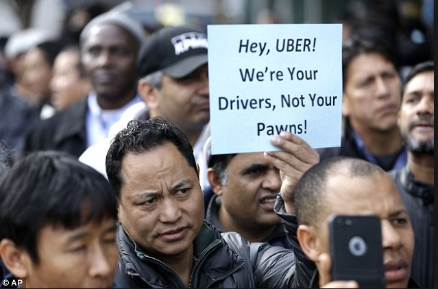 Uber drivers strike outside their New York offices